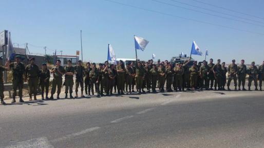 צילום: חדשות 0404 שבה להכרה אלמנתו של מיכי מרק, חיילים עמדו במשמר כבוד לזכרו