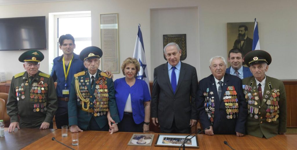 עמוס בן גרשום, לע"מ